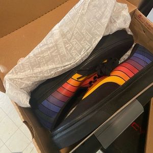 Rainbow low top converse sneakers